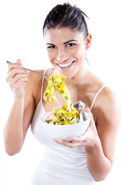 スリミングダイエットをしているかなり若い女性。ダイエットに関する概念イメージ