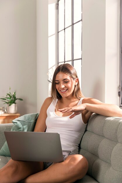 Pretty young woman relaxing at home