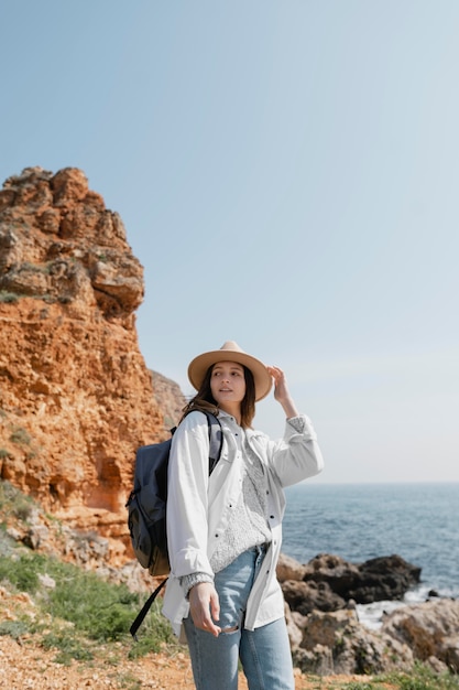 Pretty young woman traveling by herself