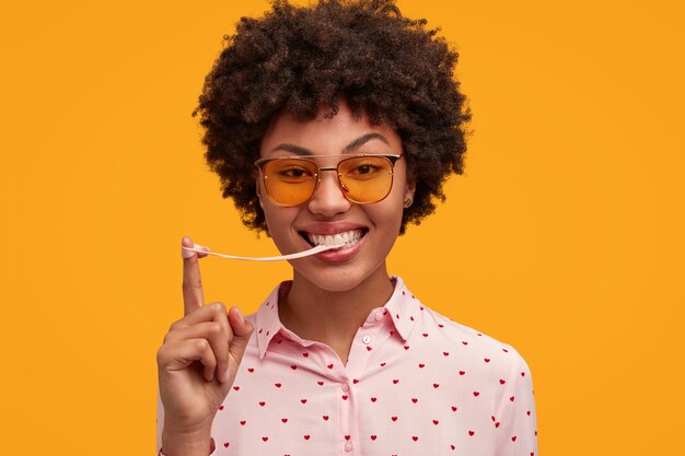 Pretty young woman with curly hair