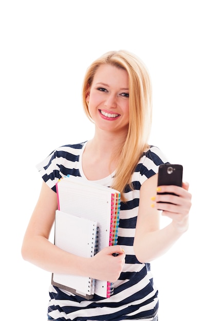 Pretty young woman with mobile phone