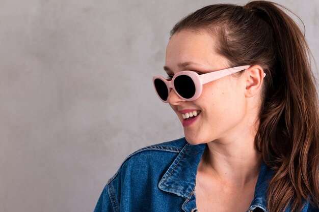 Pretty young woman with sunglasses