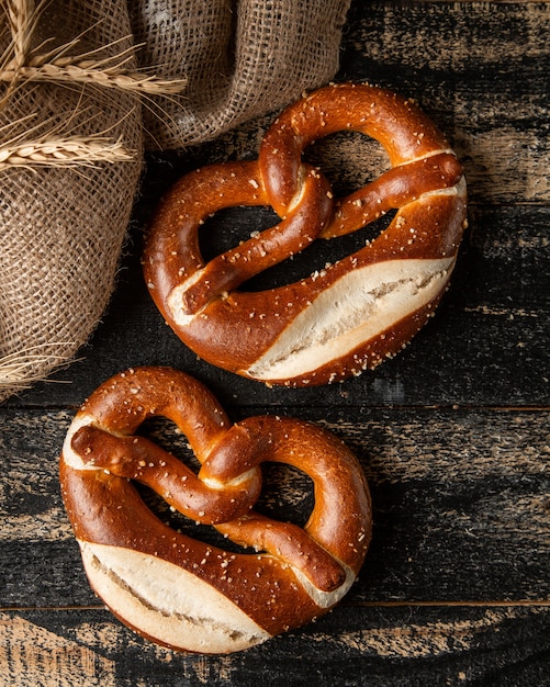 pretzel and wheat on table