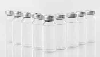 Free photo preventive coronavirus vaccine bottles arrangement