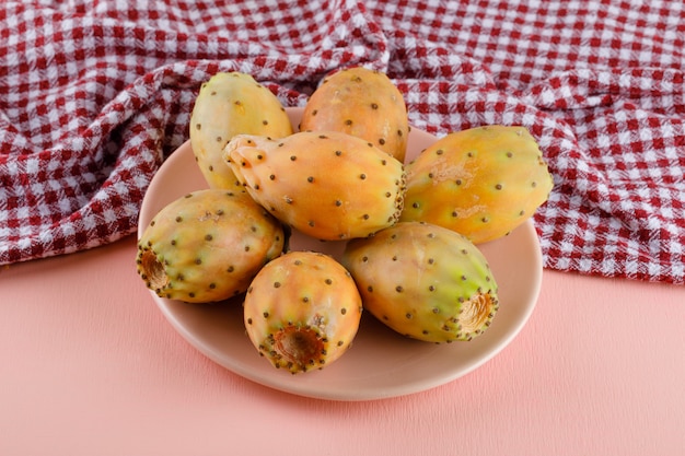 Prickly pears in a plate on picnic cloth