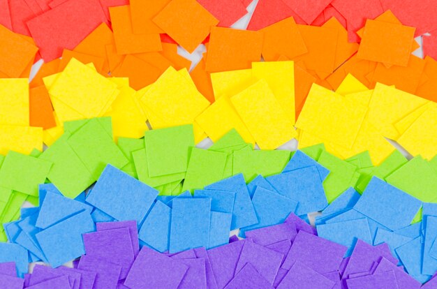 Pride flag with colorful paper sheet