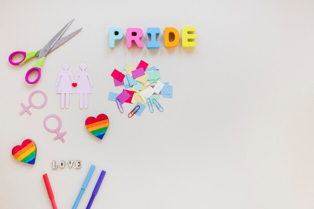 Pride inscription with lesbian couple icon and rainbow hearts