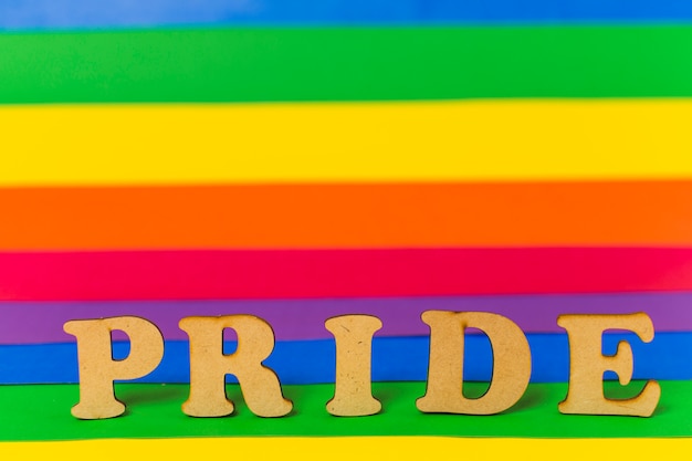 Pride word and LGBT flag