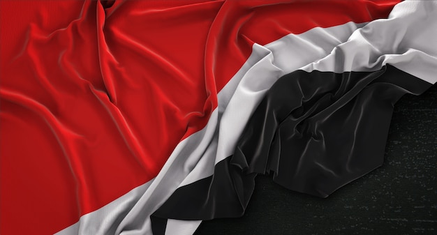 Free photo principality of sealand flag wrinkled on dark background 3d render