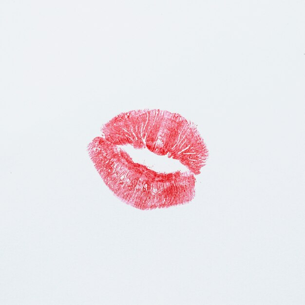 Print of red lips on white