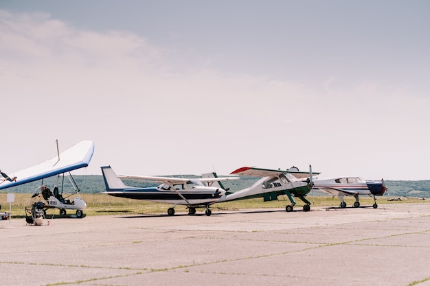 Free photo private airplanes in the field