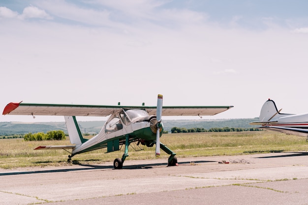 Free photo private airplanes in the field