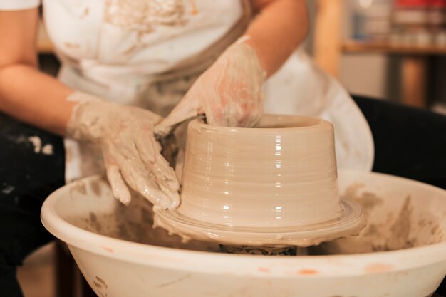 The process of forming vessels with clay