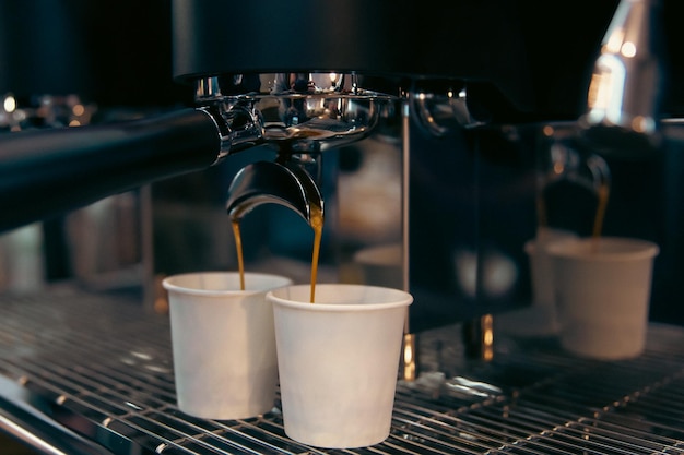 The process of preparing espresso in a professional coffee machine closeup