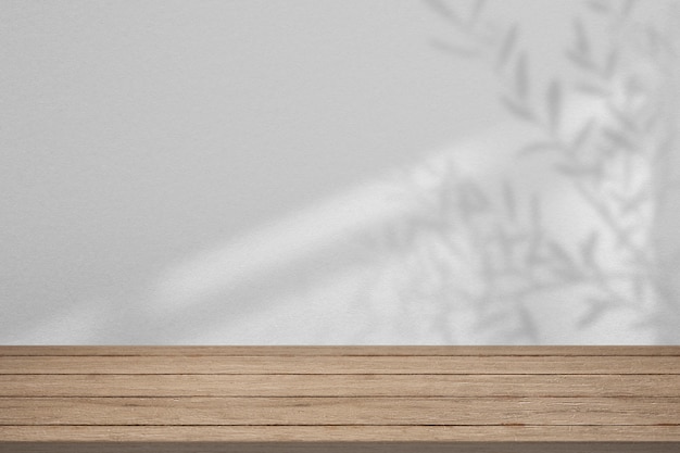 Product backdrop, empty wooden floor with leaves shadow