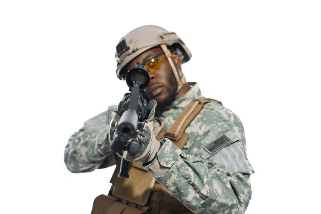 Professional American soldier aiming with weapons machine