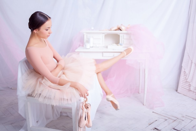 Professional ballet dancer resting after the performance.