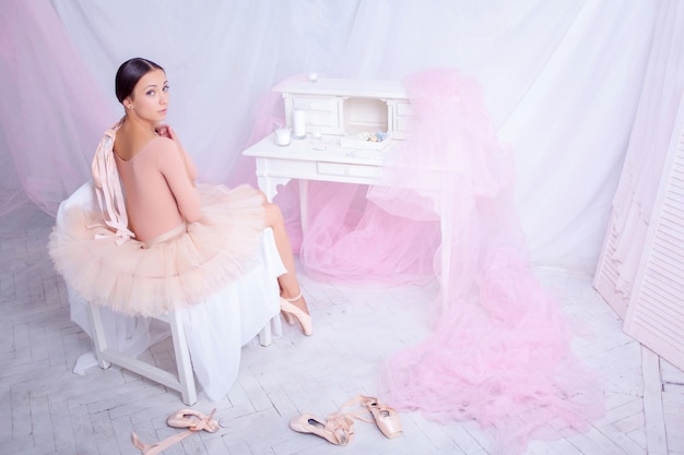 Professional ballet dancer resting after the performance.