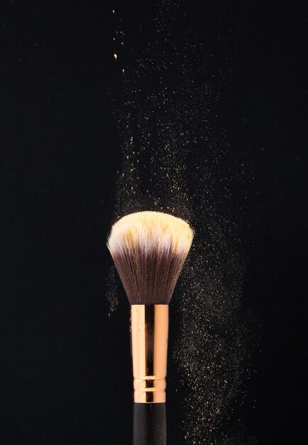 Professional black make-up brush with powder