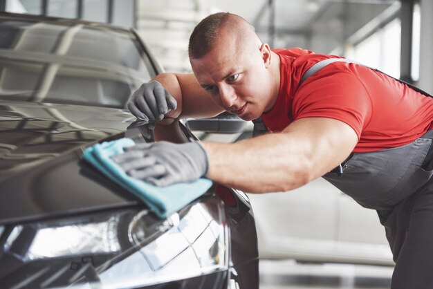 Professional cleaning and car wash in the car showroom.