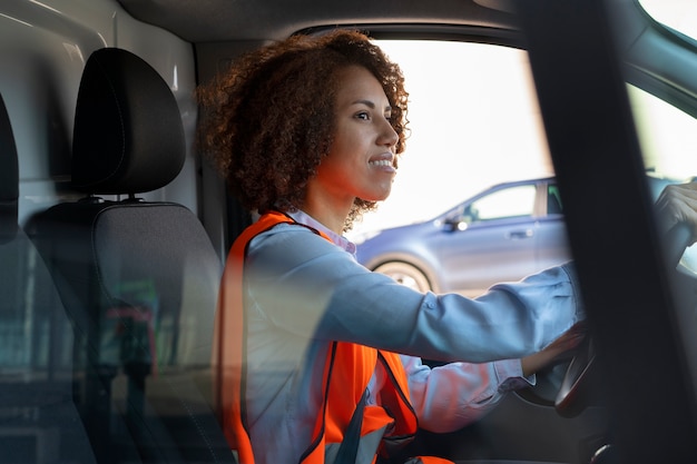 Professional female driver on job