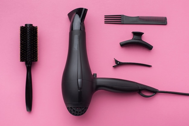 Professional hair dryer in flat lay