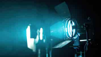 Free photo professional lighting equipment on the movie set with smoke in the air