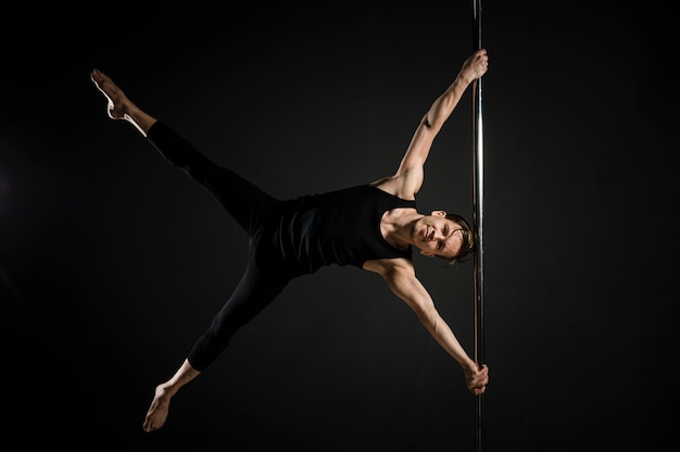 Professional male pole dancer