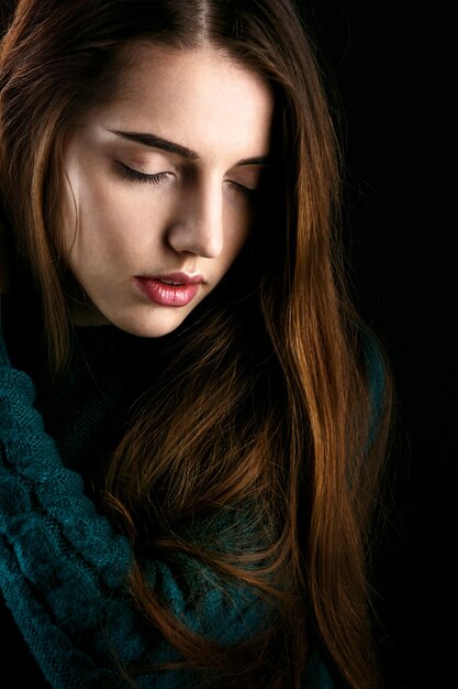 Profile of sensetive young woman with pink lips 