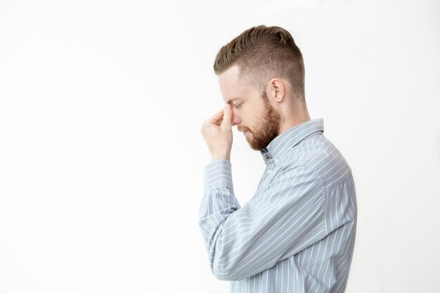 Profile of Serious Young Man Thinking Deep