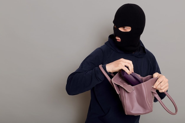 Profile of a thief guy with a masked face