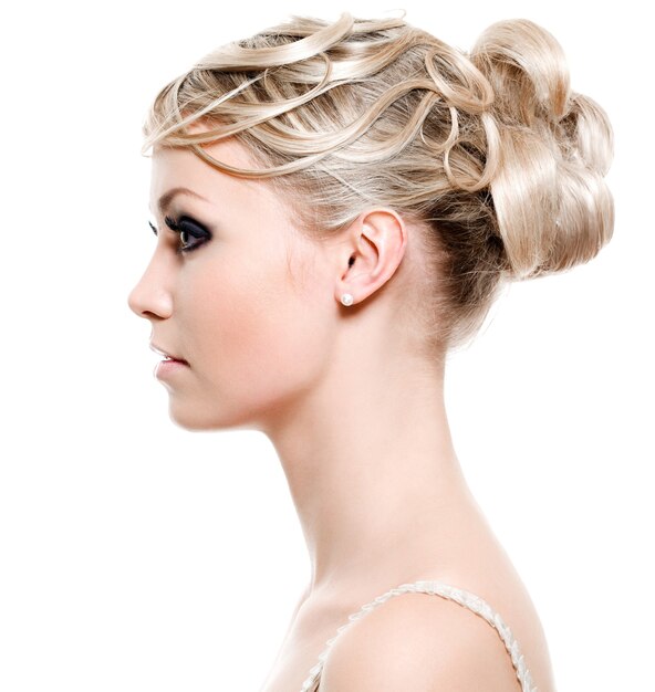 Profile of young woman with beauty fashion hairstyle