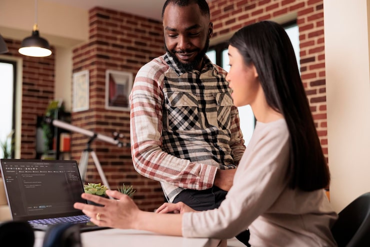 Free Photo programmers couple developing encryption code on laptop, using terminal window with html script and binary code. programming online application cloud server with firewall security.