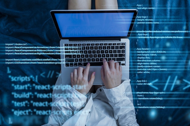 programming background with person working with codes on computer
