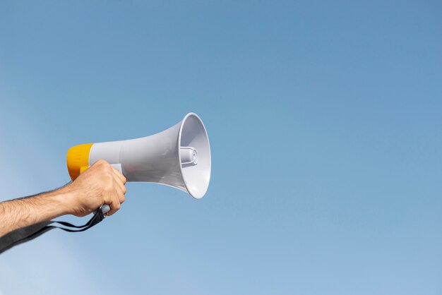 Protester holding megaphone for demonstration