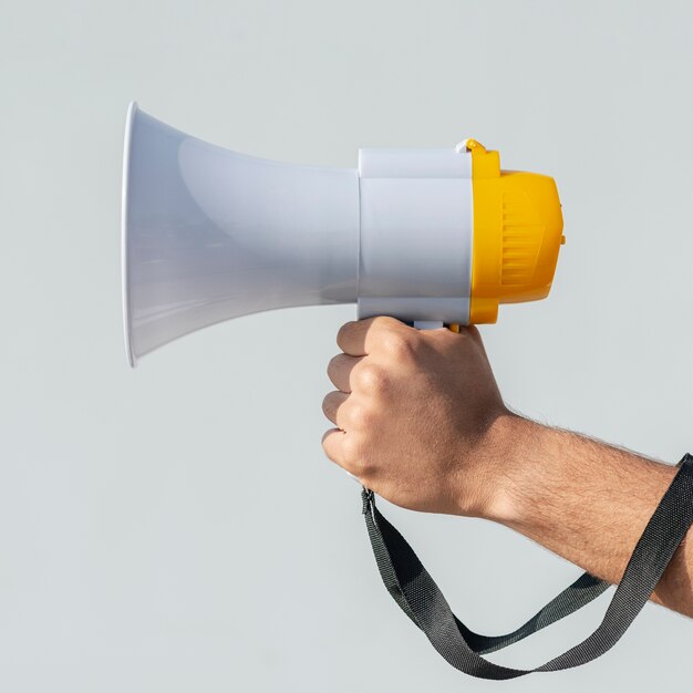 Protester holding megaphone at demonstration