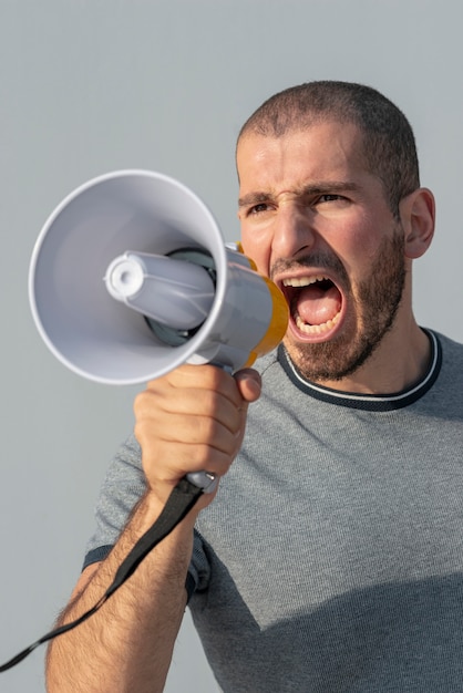 Protester shouting with megaphone