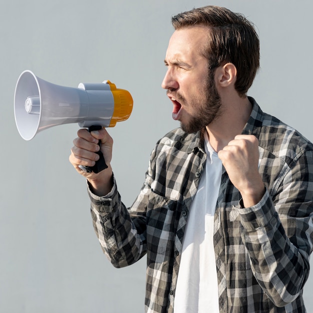 Protester with megaphone shouting 