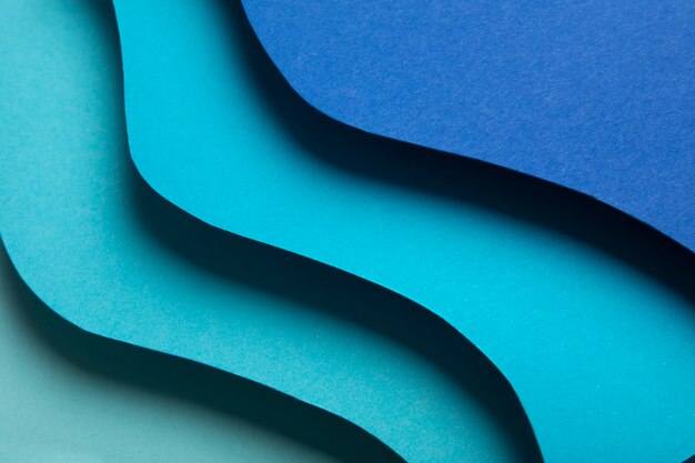 Psychedelic paper shapes in different color tones