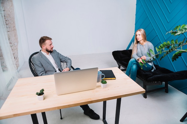 Psychologist having session with her female patient in office