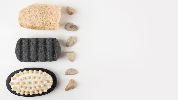 Pumice stone; massage brush; loofah and spa stones isolated on white background