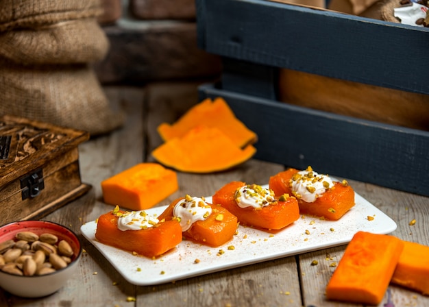 Pumpkin dessert with grated pistachios