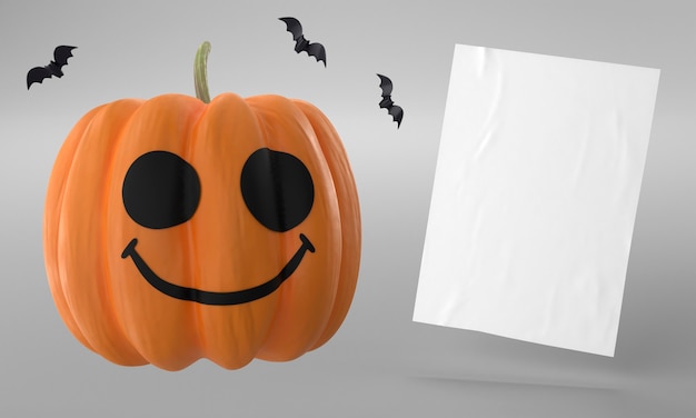 Free photo pumpkin and paper page for halloween