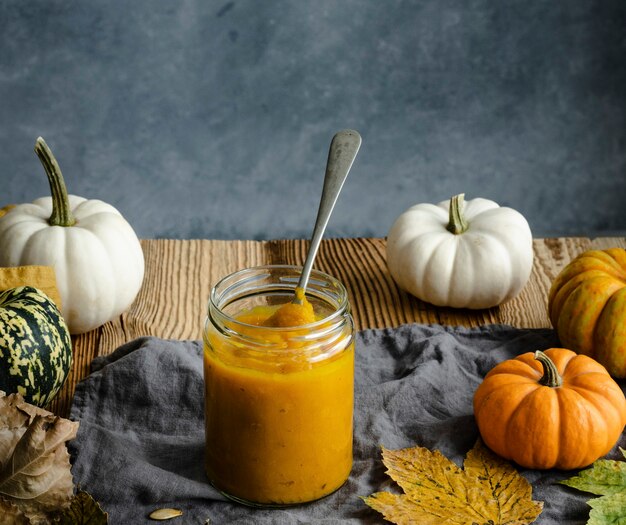 Pumpkin puree in glass jar pie ingredient closeup