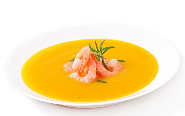 Pumpkin soup with shrimp and rosemary