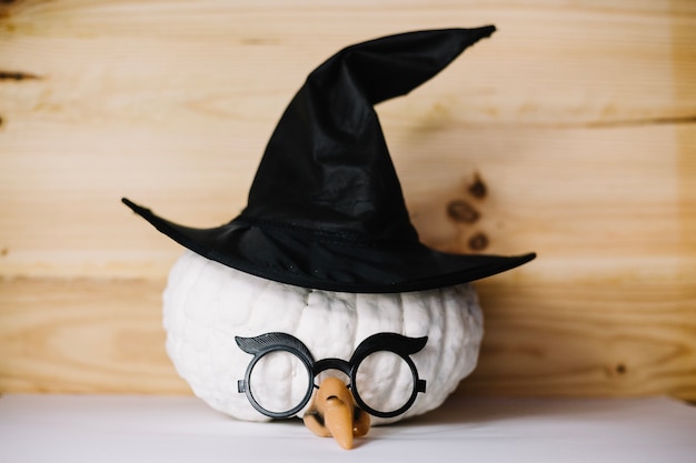 Pumpkin with witch hat and eyeglasses