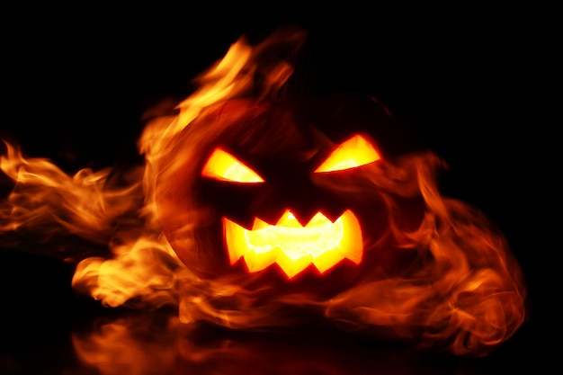 Free photo pumpkin within flames