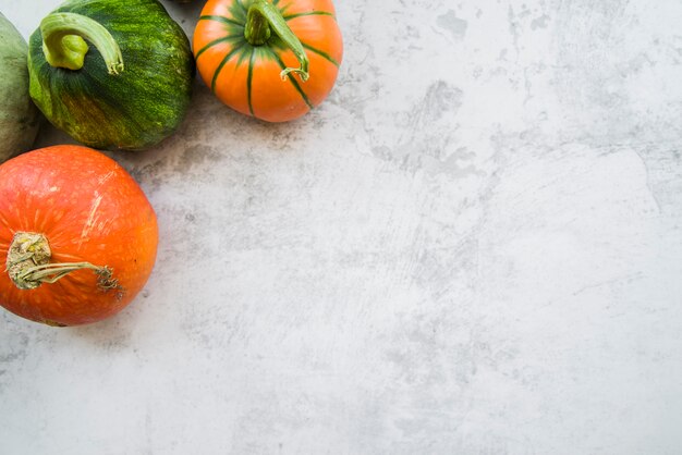 Pumpkins on marble table