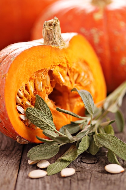 Free photo pumpkins with sage