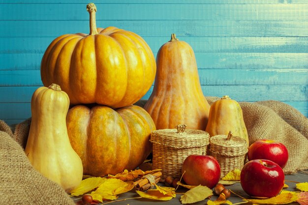 Pumpkins on wooden board